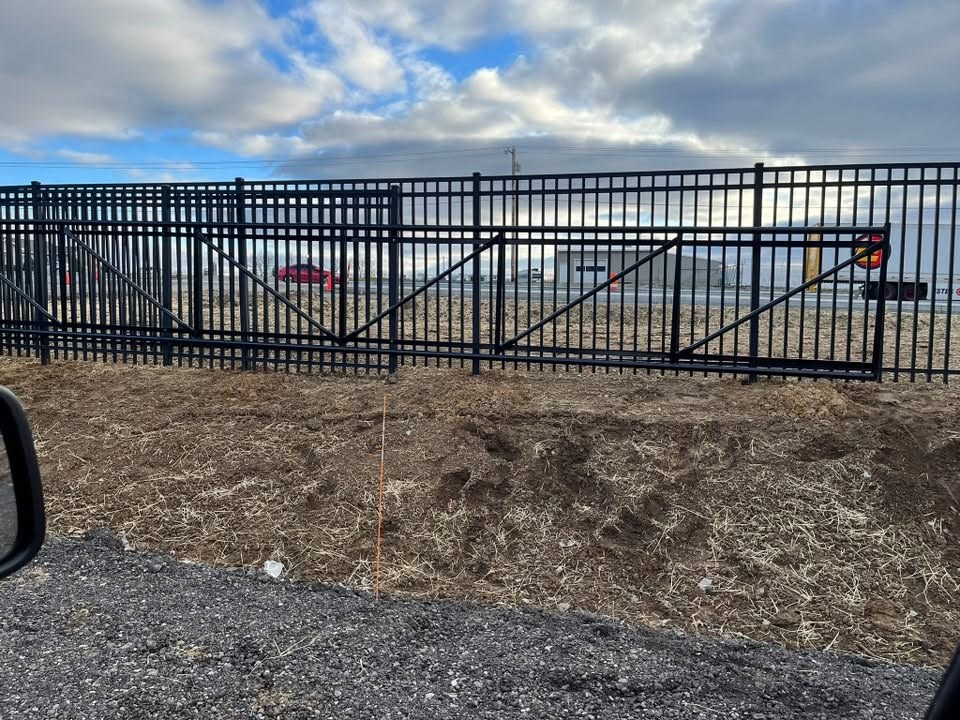 Black aluminum fence with double gate